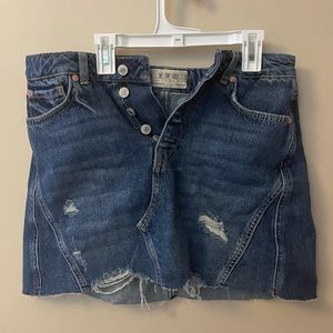 Jean skirt with multiple buttons